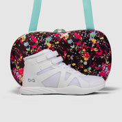 Nfinity Beast mid-top cheer shoe in white with a paint-splatter shoe case