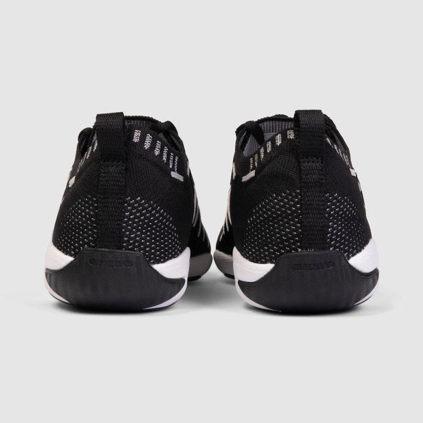 Nfinity Flyte cheer shoe in black, pair, heel view