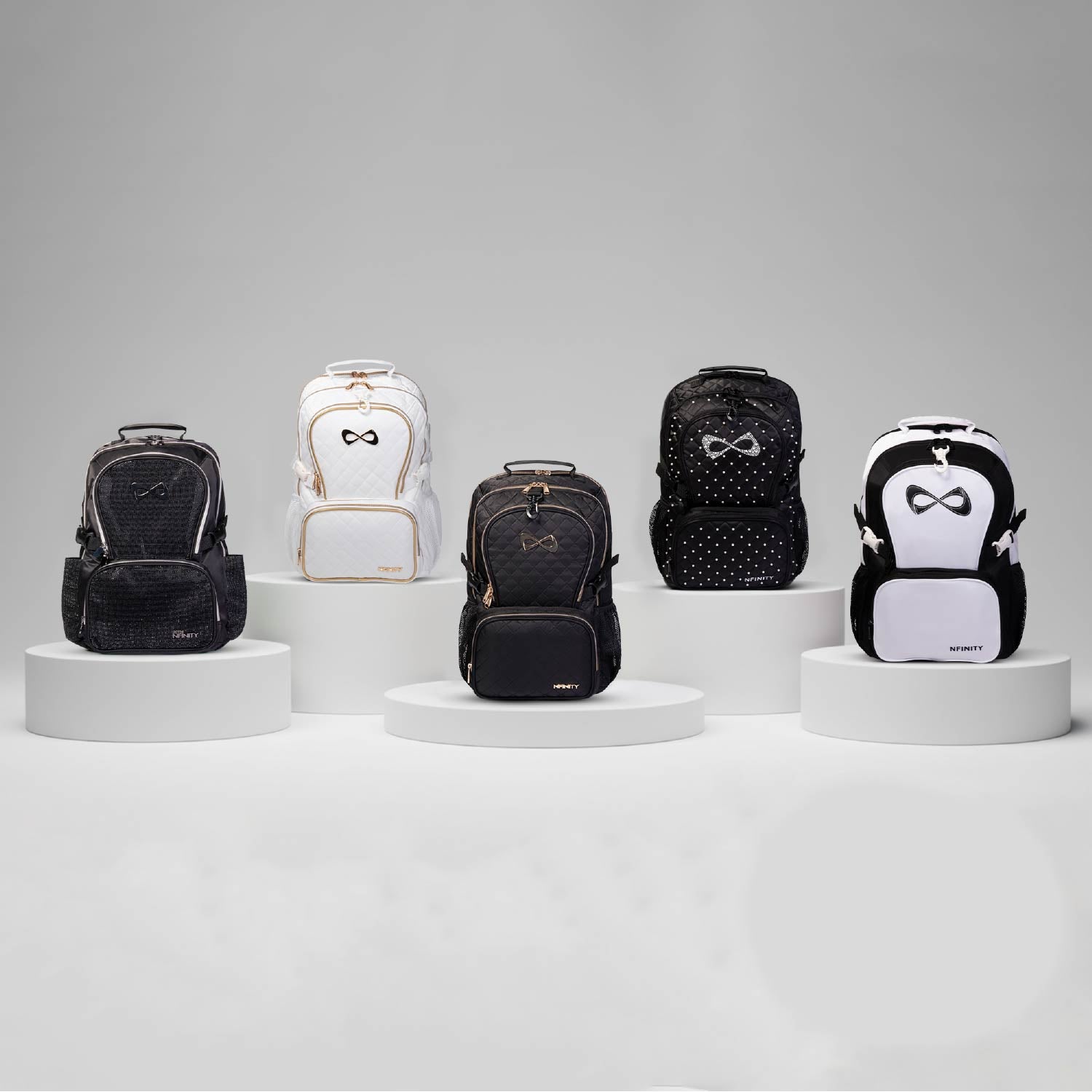 Nfinity cheerleading backpacks in black and white on display